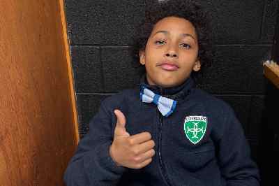 Tahj, 6th grader. I am going as a ghost and my favorite candy is Skittles.